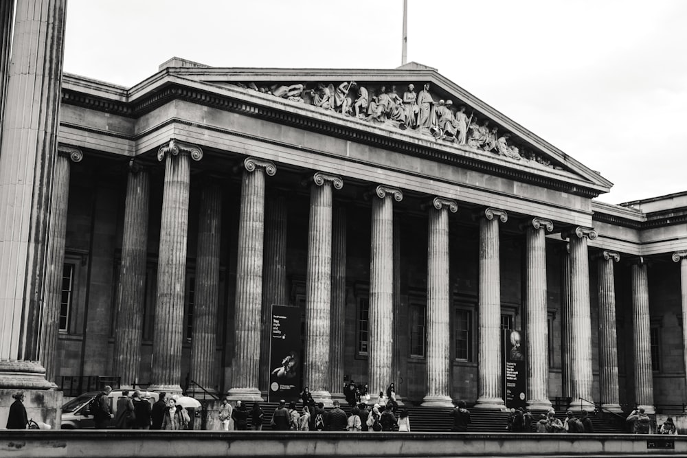 a building with columns and statues