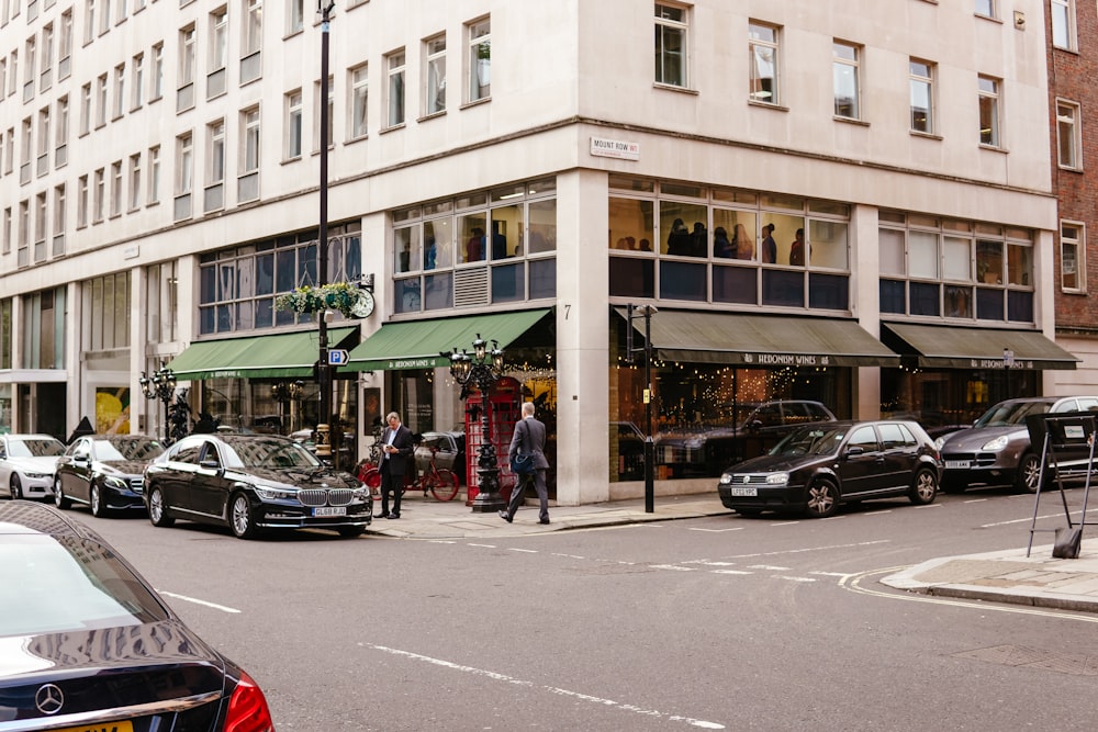 a group of cars parked outside a building