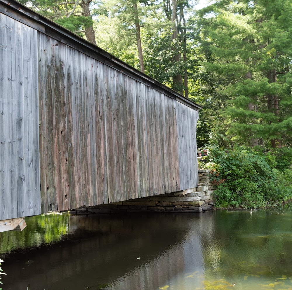 a wooden bridge over a river