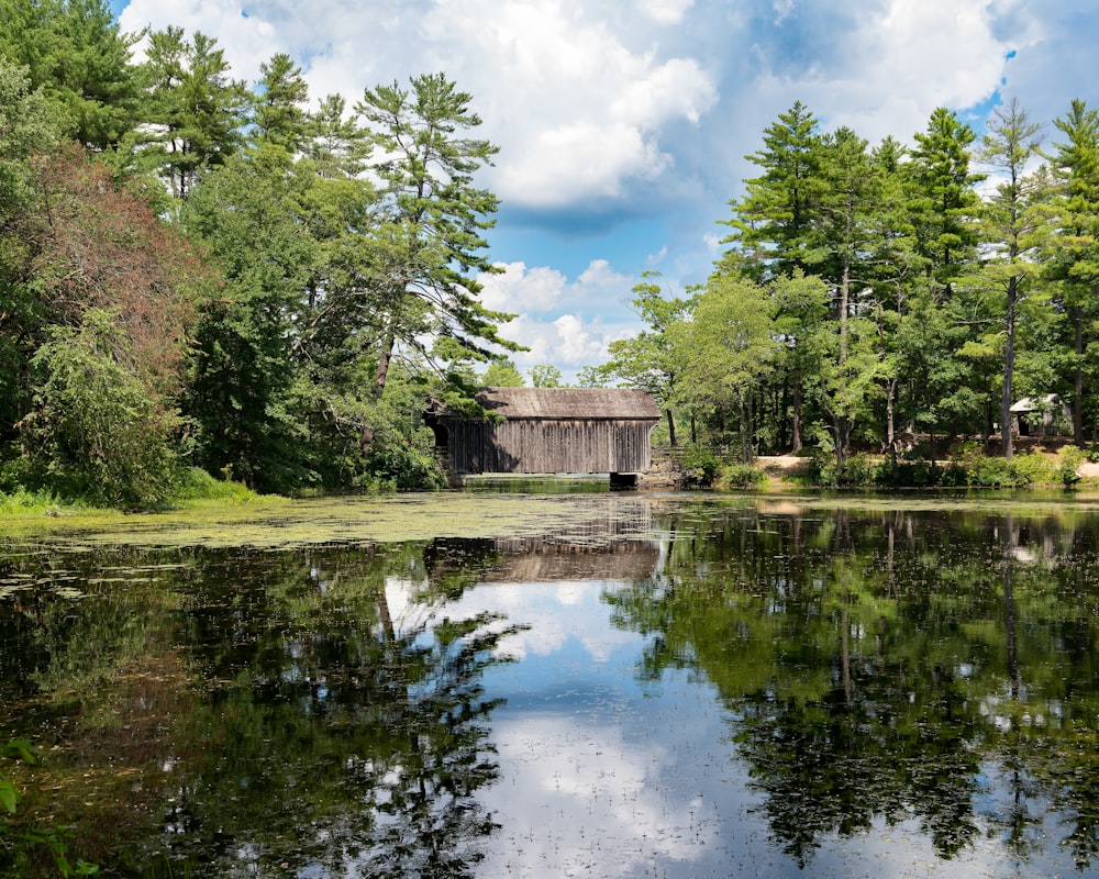 a small building on a lake