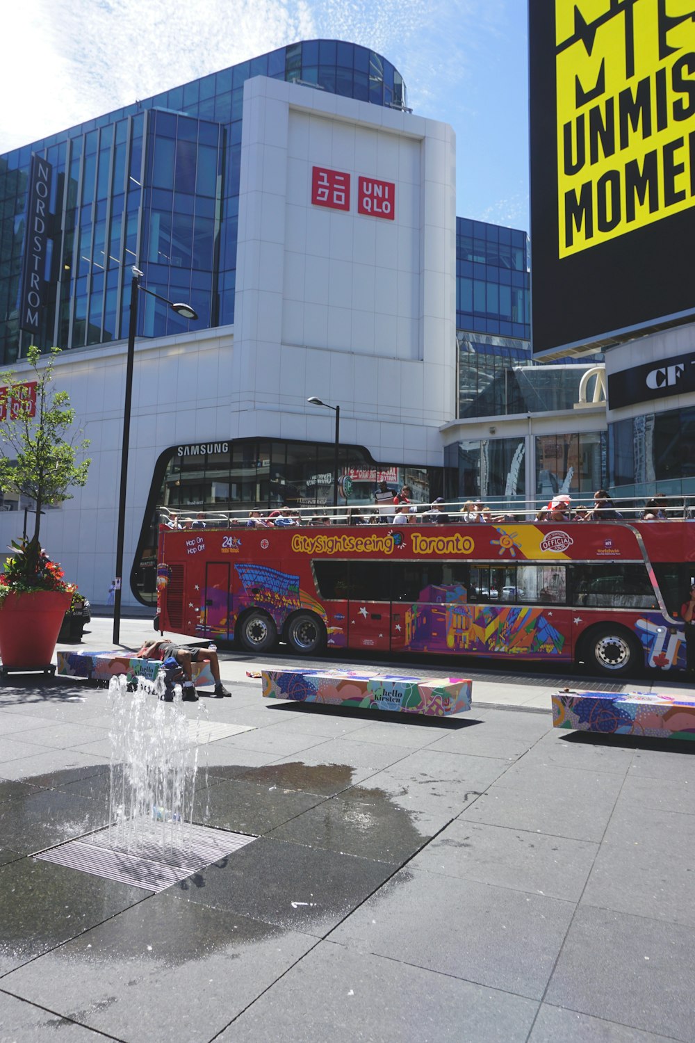 a red bus parked outside a building