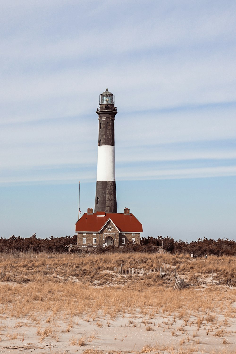 a lighthouse in a field