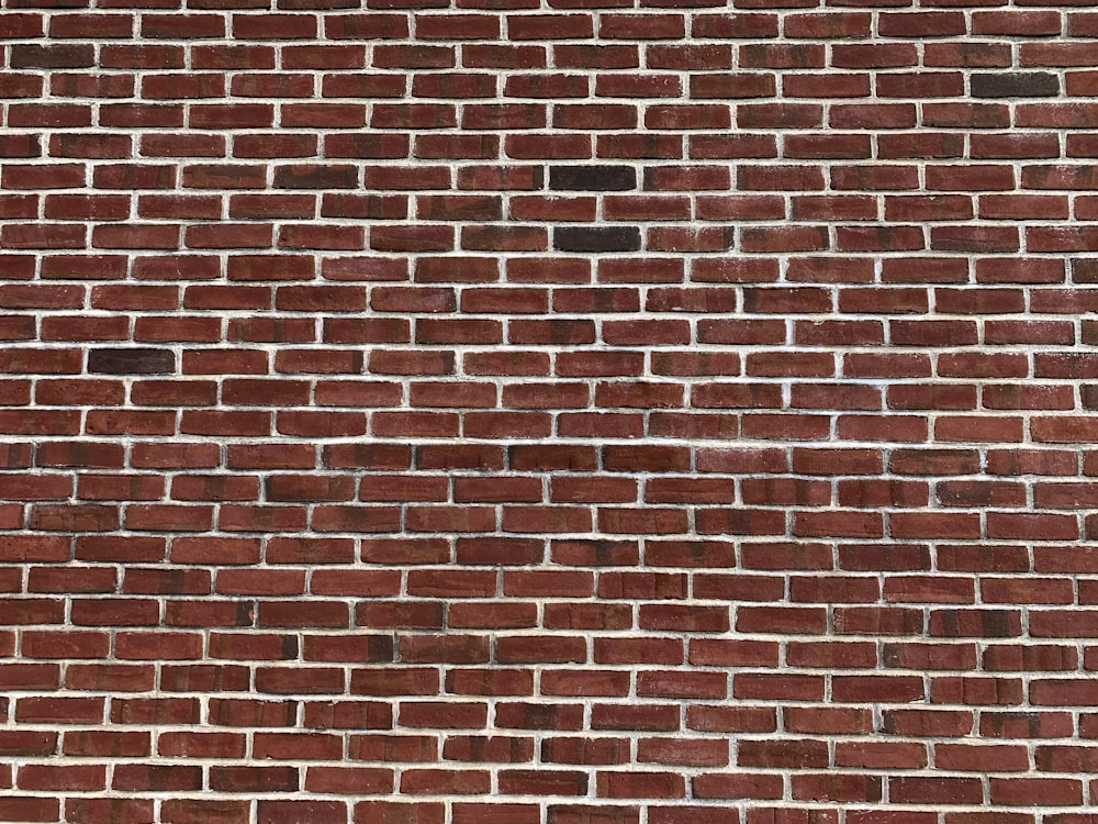 a brick wall with a hole in it