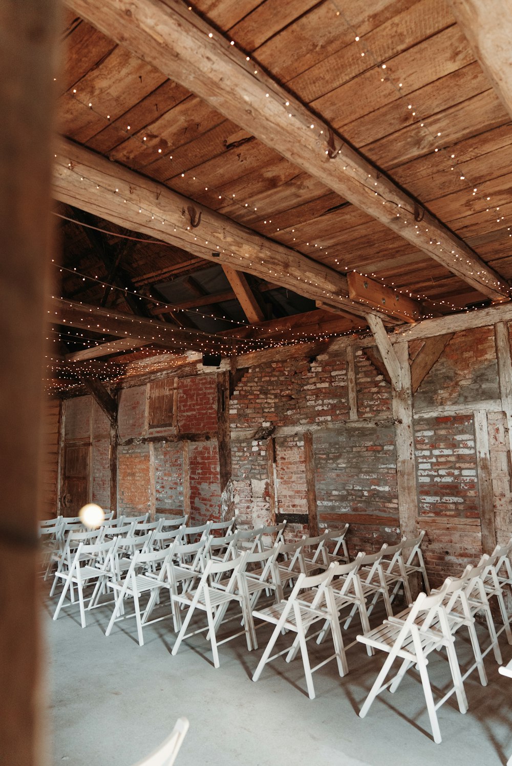 a room with white chairs