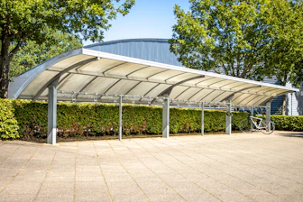 a covered area with a bike rack