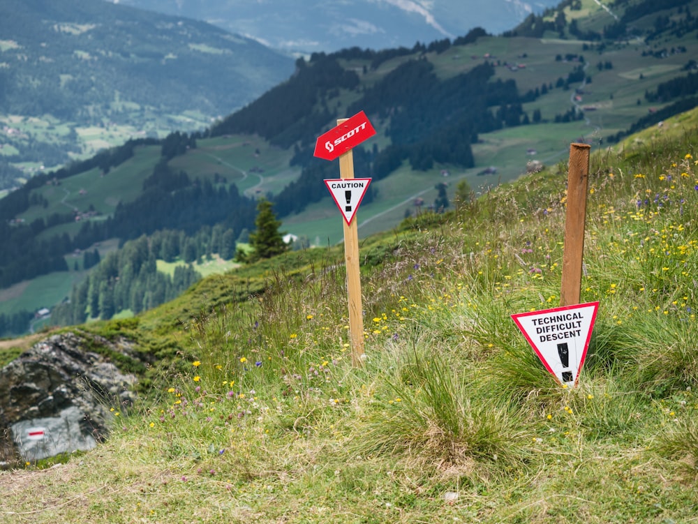 a sign on a hill