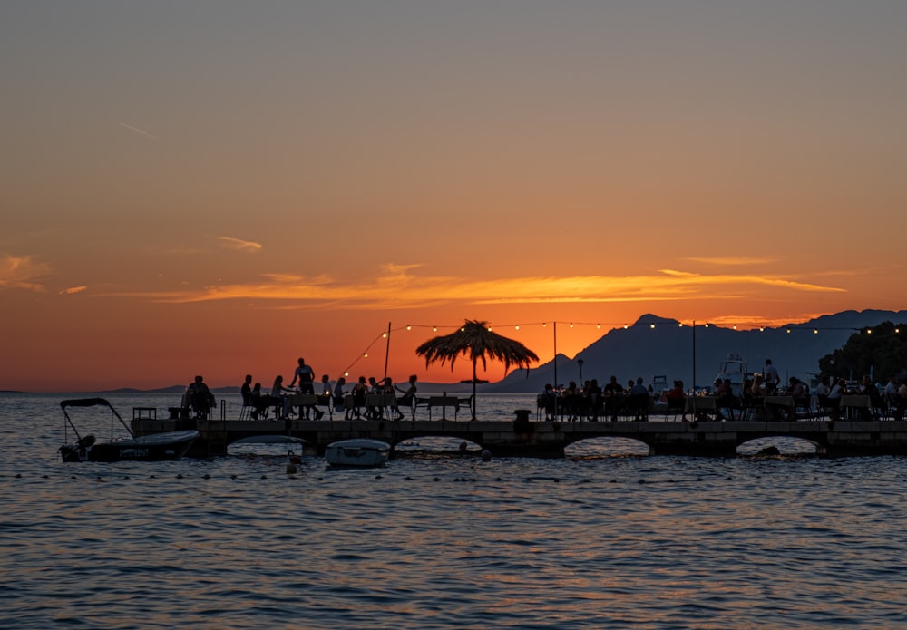 a group of people on a dock