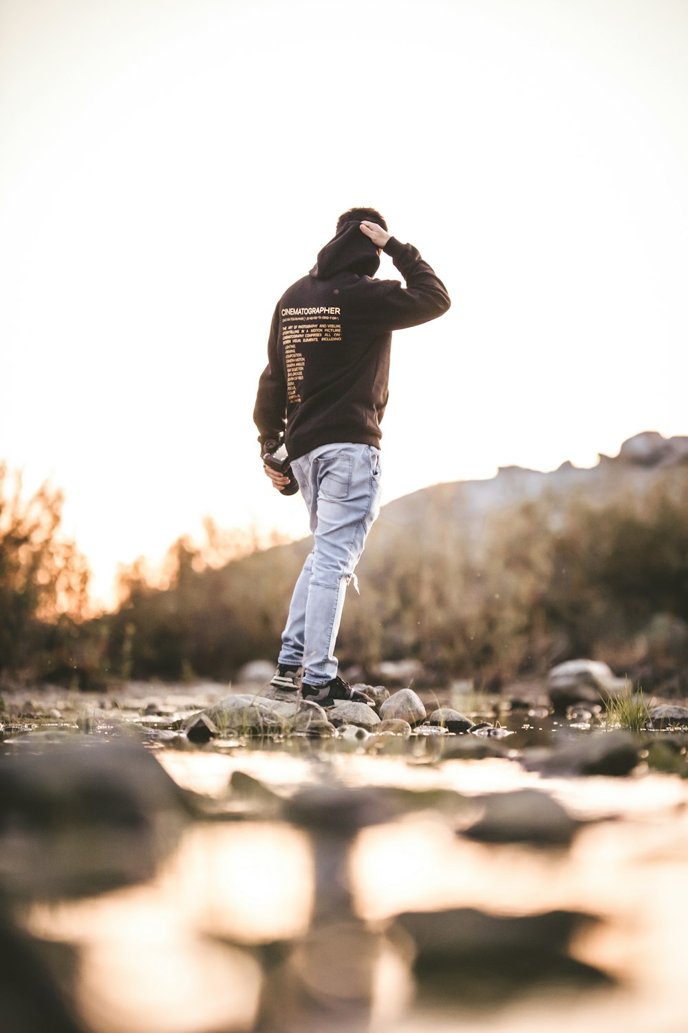 a man standing on a rock