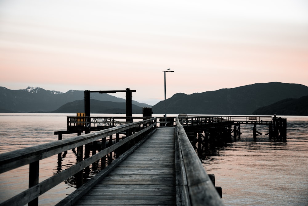 a wooden dock over water