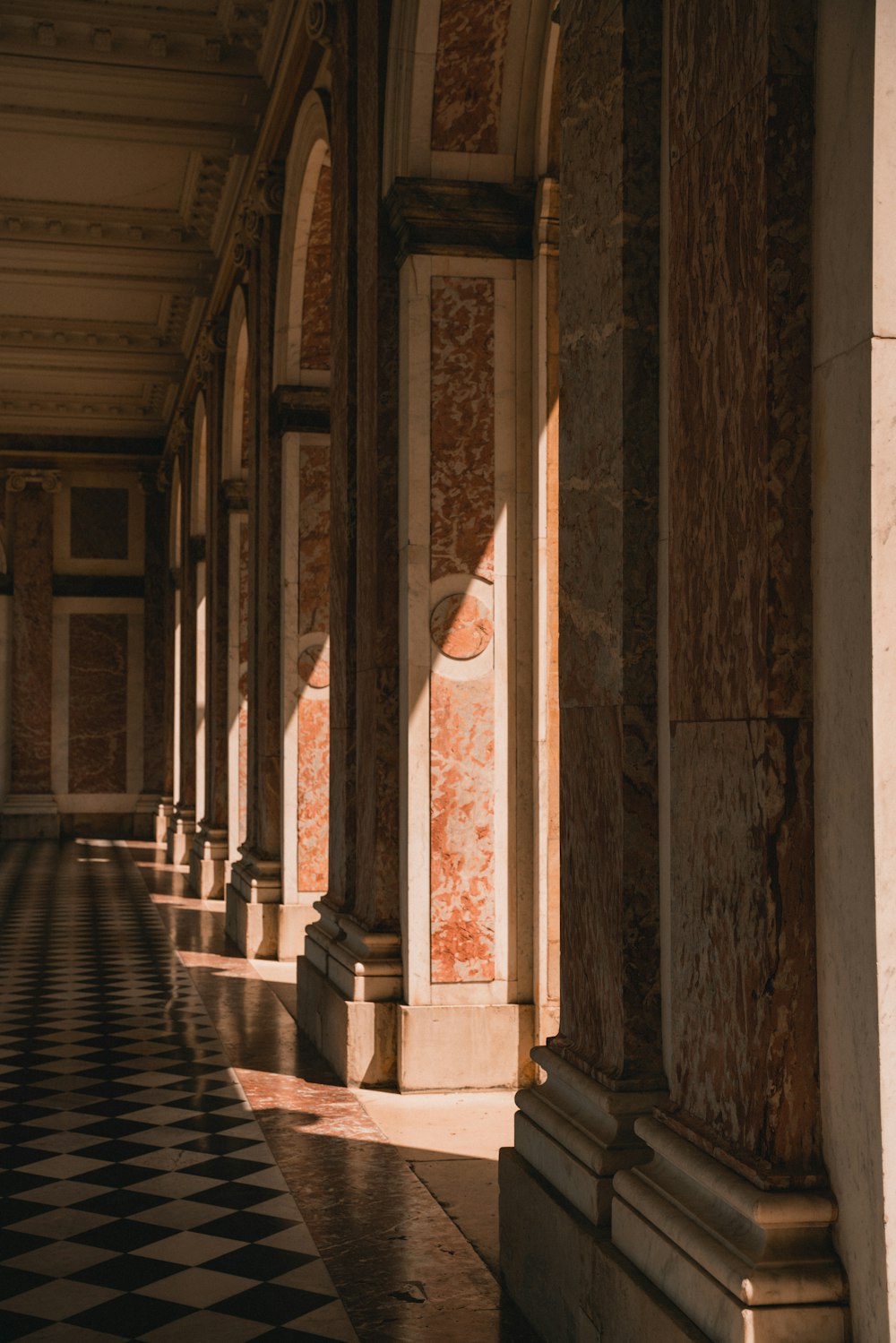 a hallway with pillars