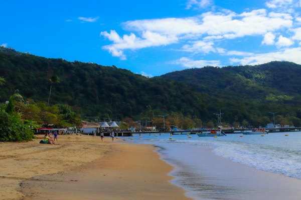 The beach at Abraão below the forested hills — Ilha Grande, Brazil