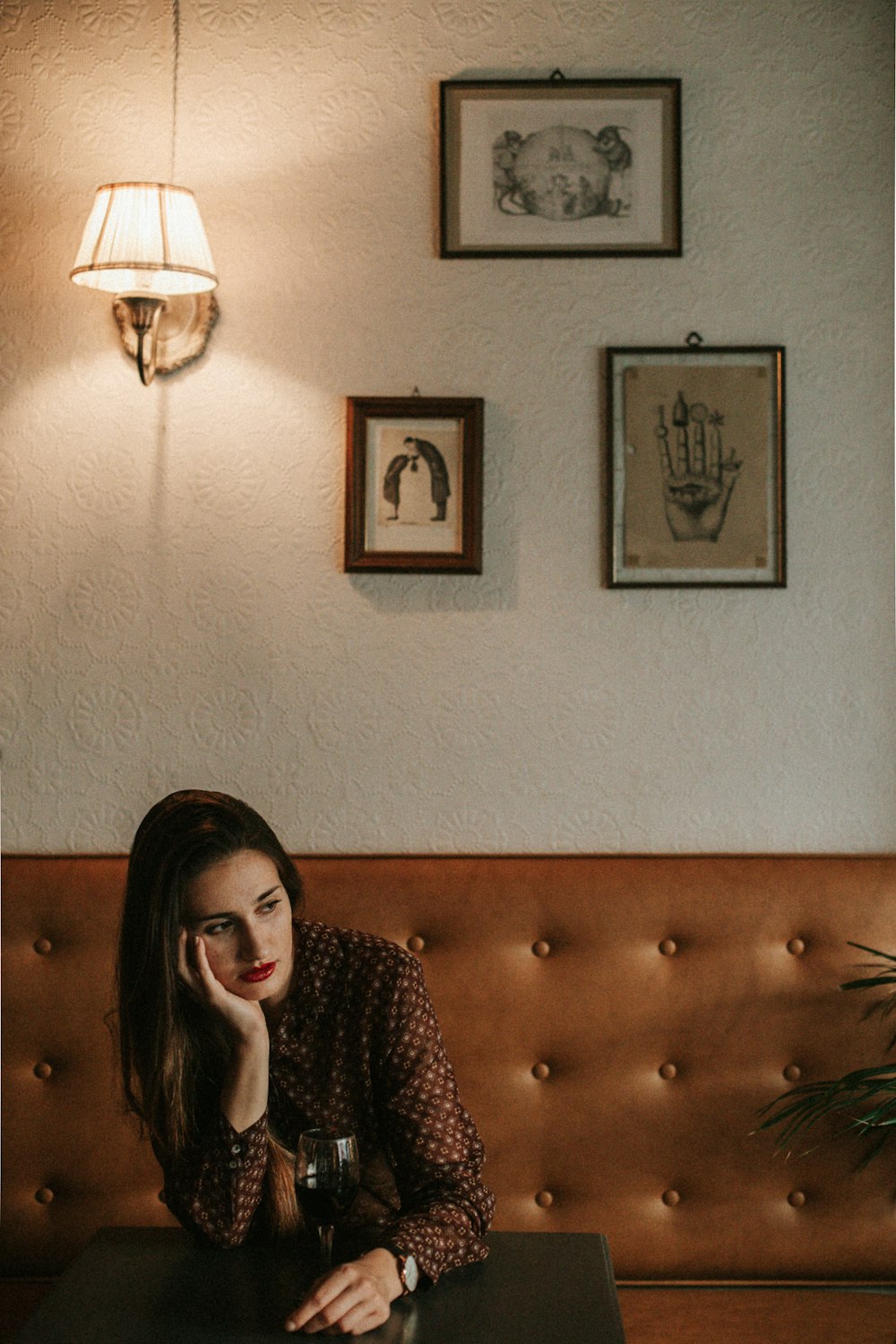 a woman sitting at a table