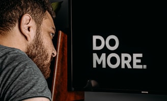 a man looking at a computer screen