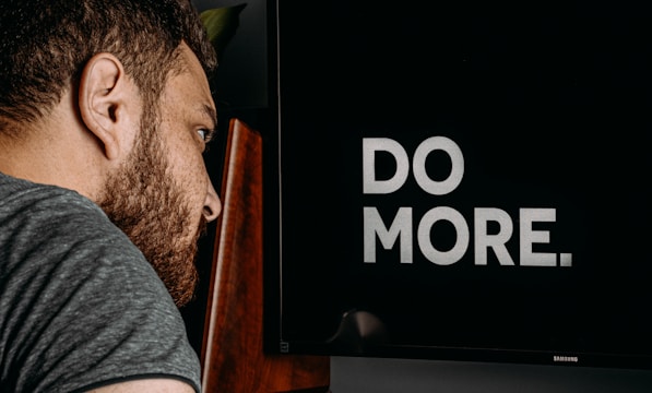 a man looking at a computer screen