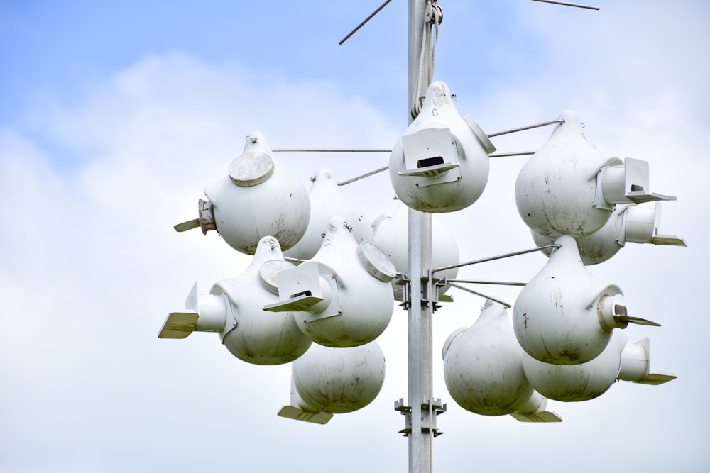 a group of white satellite dishes