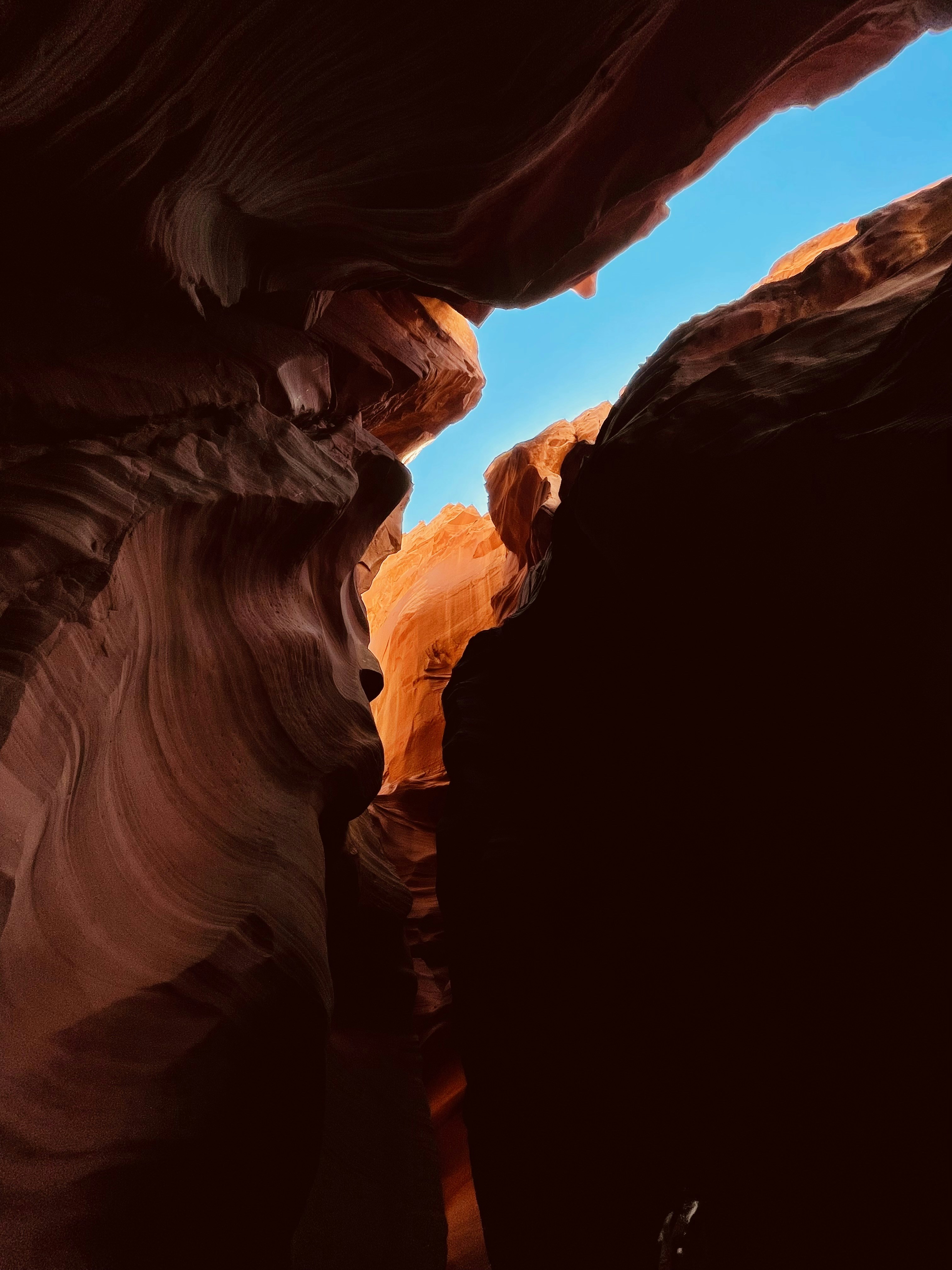 a person standing in a cave