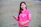 a person in a pink shirt