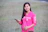 a person in a pink shirt