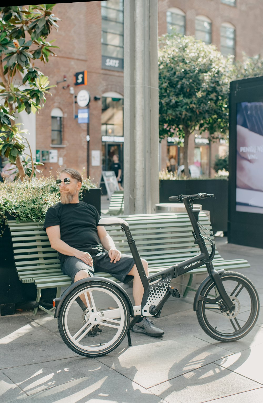 a person sitting on a bench