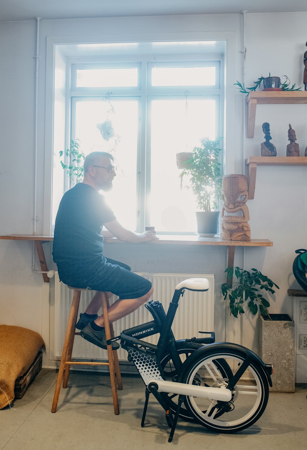 a person sitting on a bicycle