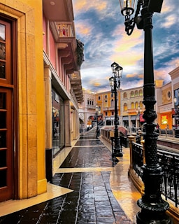 Close-up photo of Lisbon street with fresh pavement and stylish street lamps.