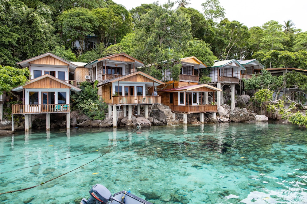 a group of houses on a rocky island