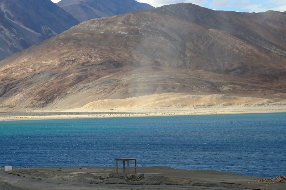 a bench on a beach