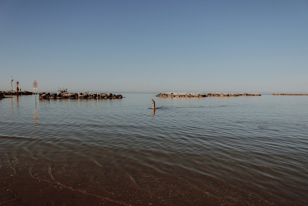 a body of water with land in the distance