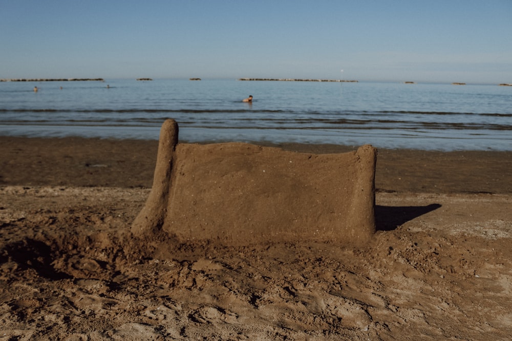 a sand sculpture on a beach