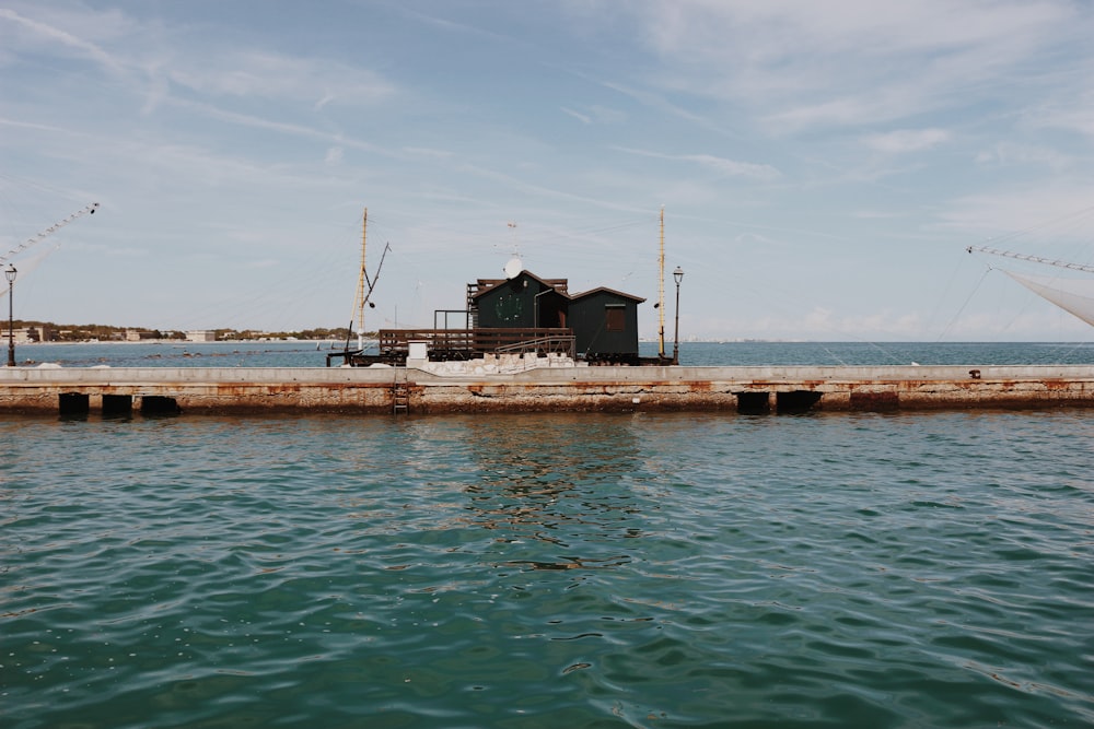 a dock with a building on it