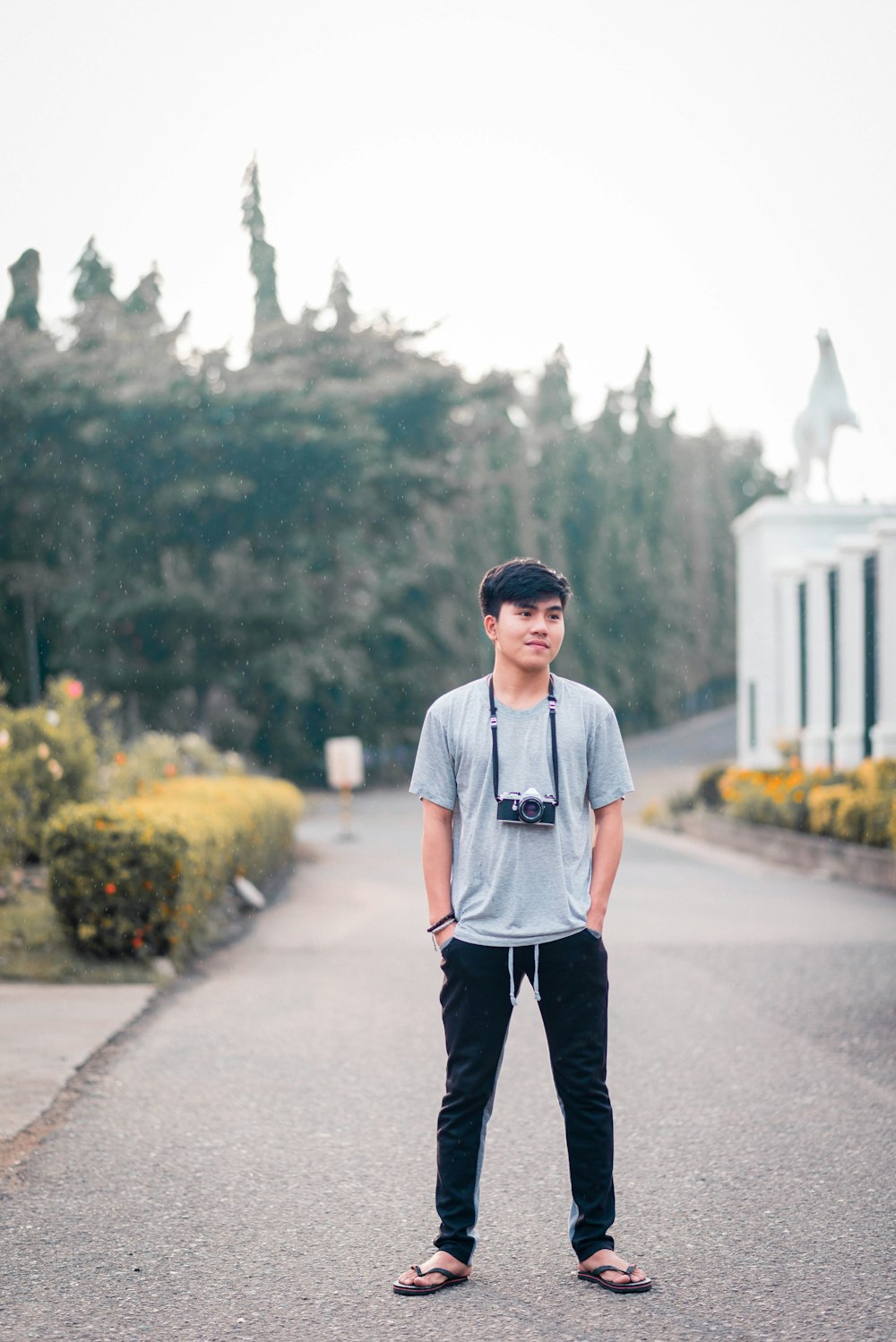 a man standing on a road