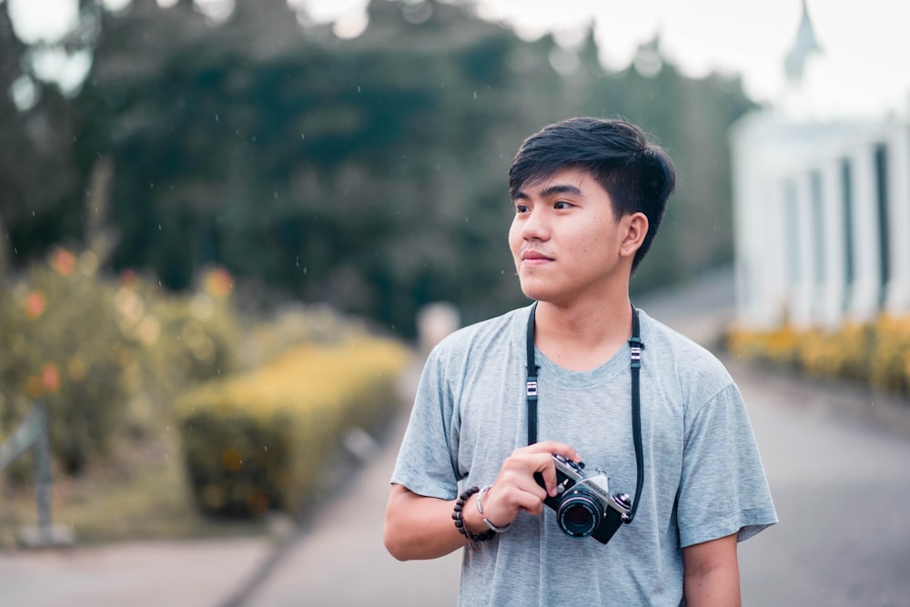 a man holding a camera