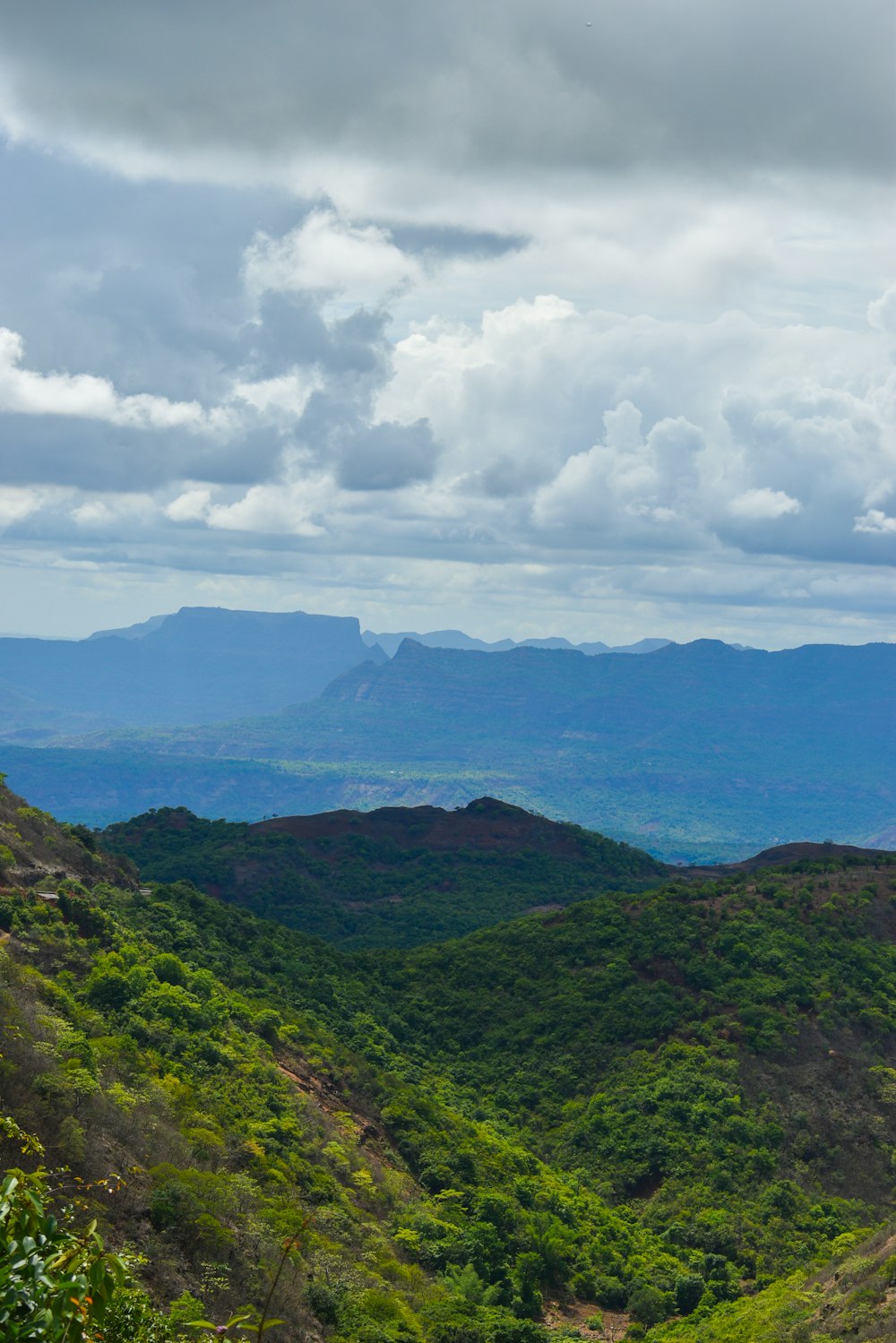 a landscape with hills and trees