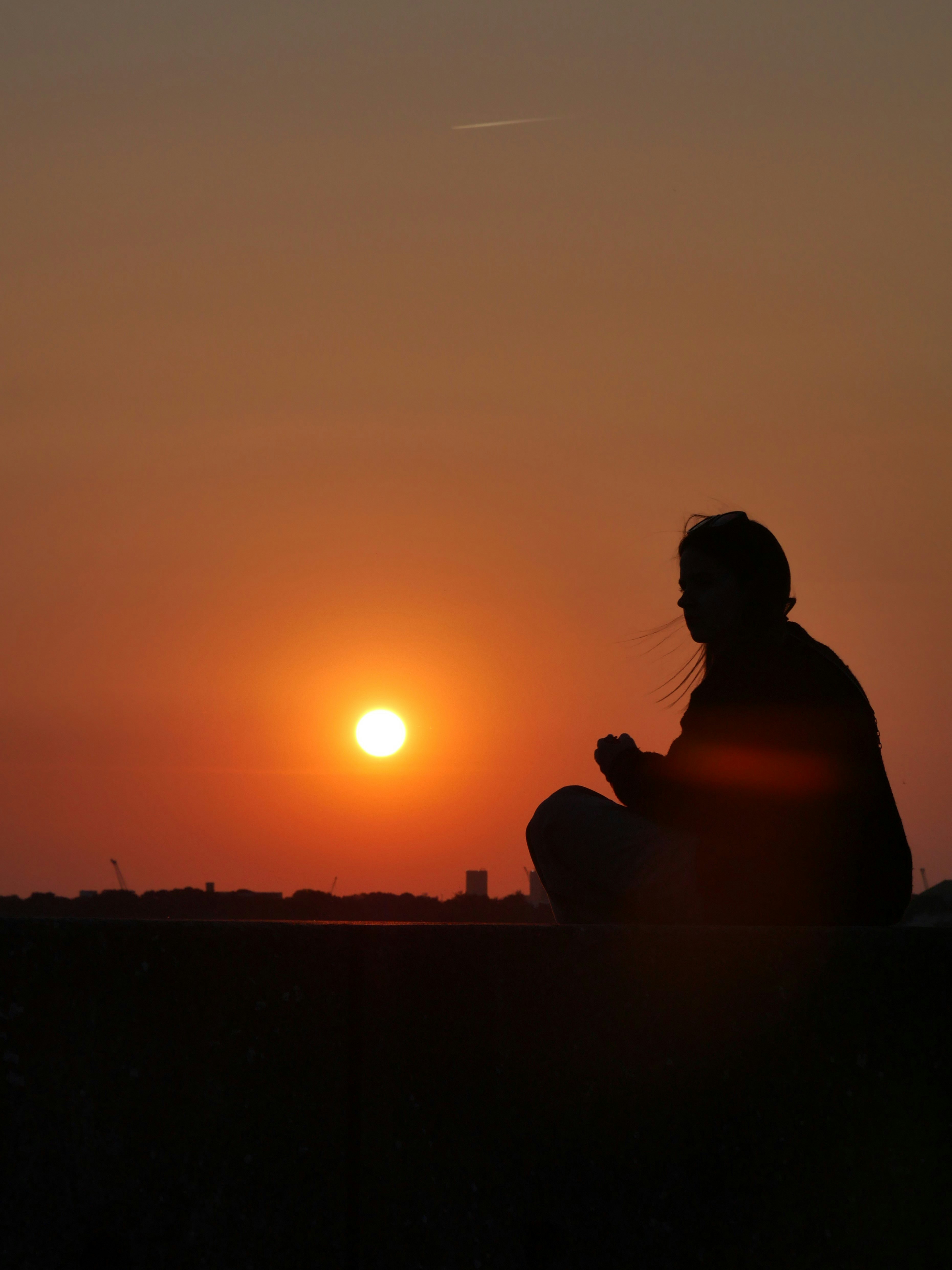 a person sitting on a bench