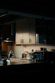 a kitchen with white cabinets