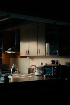 a kitchen with white cabinets