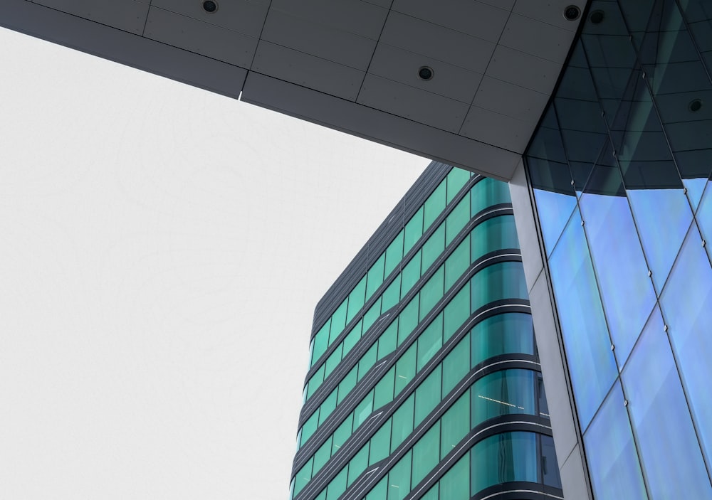 a tall building with glass windows