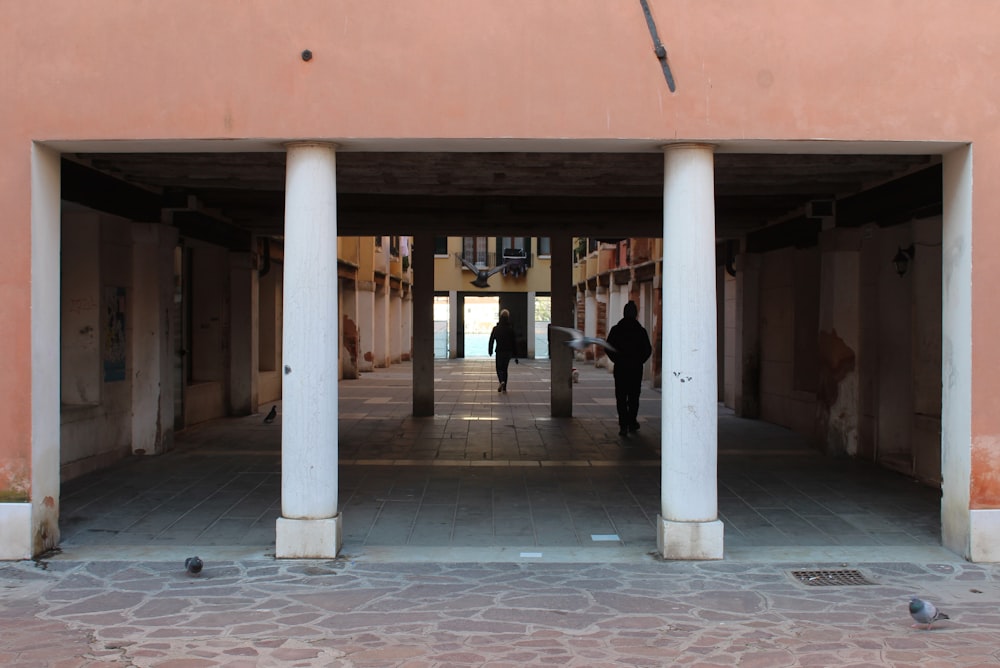 a person walking through a building