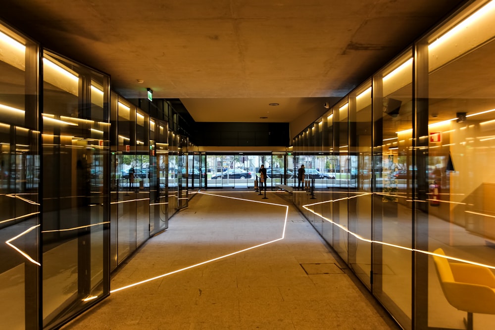 a long hallway with glass walls