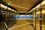 a long hallway with glass doors