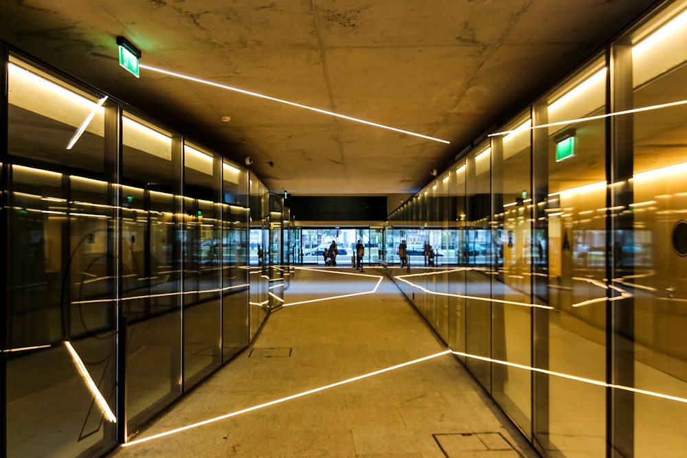 a long hallway with glass doors