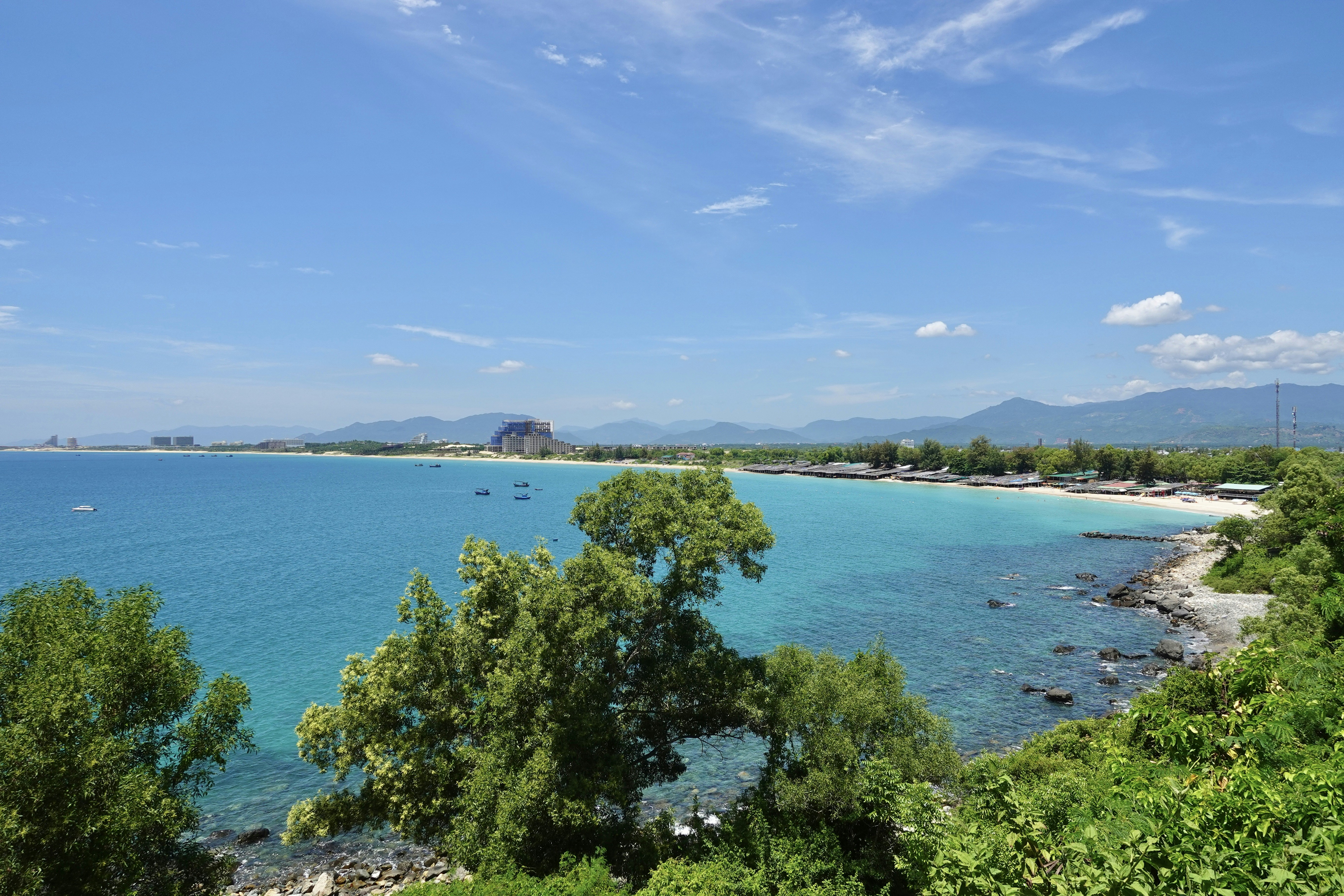 Long Beach in Cam Ranh, Vietnam. An azure stretch coastline.