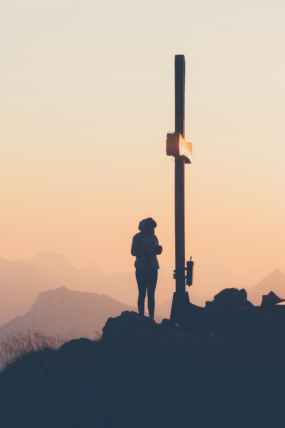 a person standing on a mountain