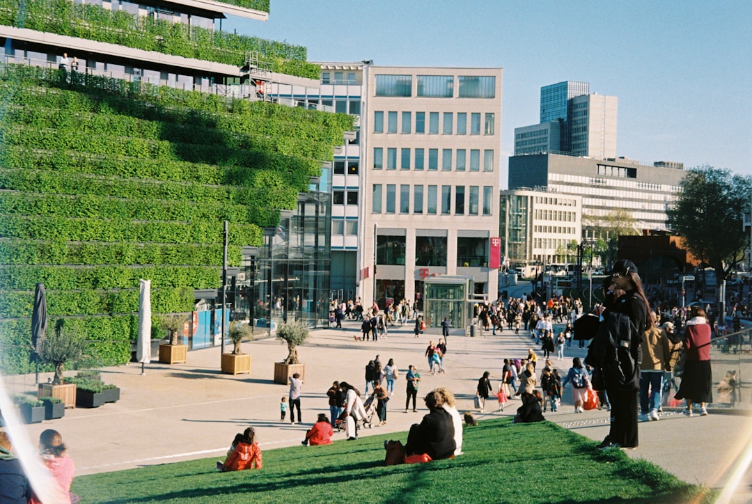 a group of people outside a building,