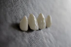 a close-up of a white pill
