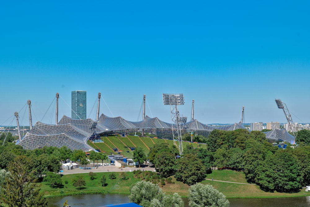 a large stadium with a bridge over it