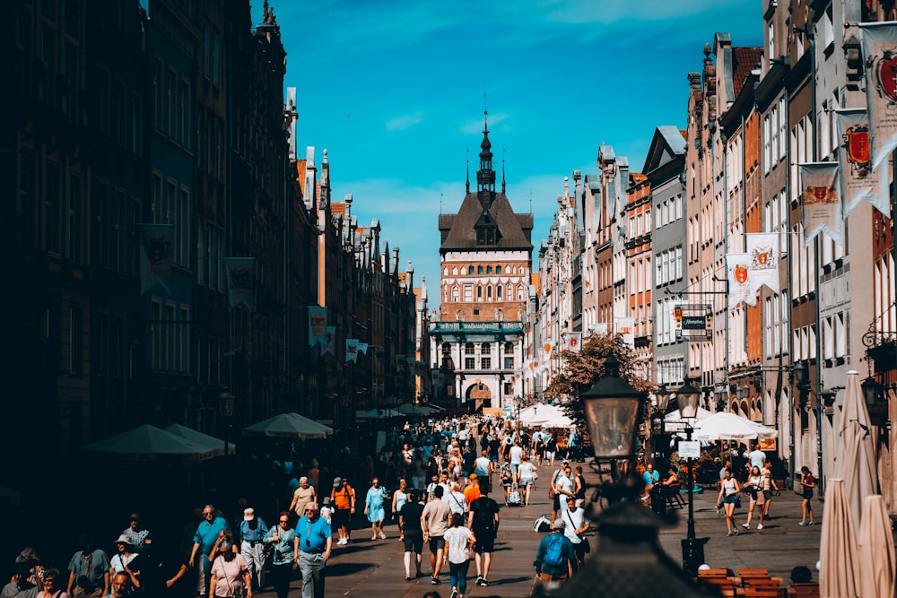 a busy street with people walking