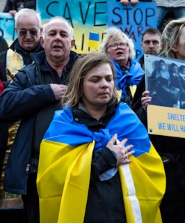 A candid photo of participants in a discussion circle sharing personal stories about Ukraine.