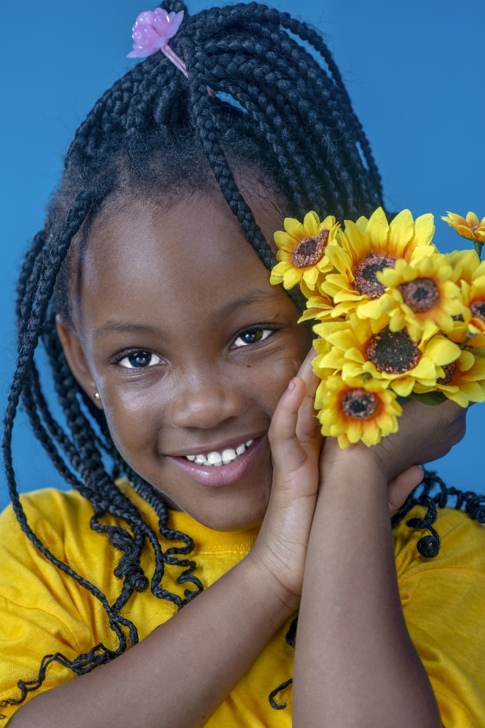 a person with flowers in the hair