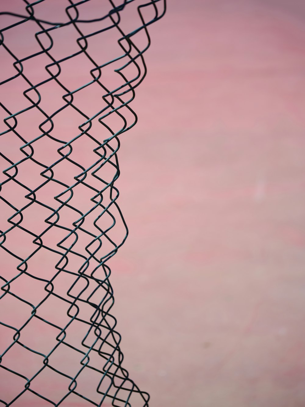 a close up of a wire fence